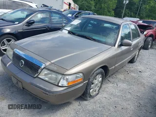 2003 Mercury Grand Marquis LS Premium z VIN 2MEFM75WX3X683205, wystawiony jako IAAI lot #42177139 z przebiegiem 200 521 mil mil oraz . Historia ofert i sprzedaży dostępna na DreamBid. Obrazek 2.