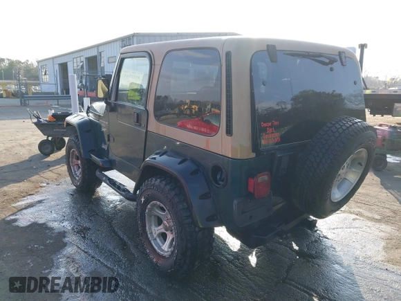 2001 Jeep Wrangler Sport with VIN 1J4FA49S71P315061, listed as a IAAI auction lot 41525441 with 178,809 mi miles. Bid and sale history available at carsss.com. Image 3.