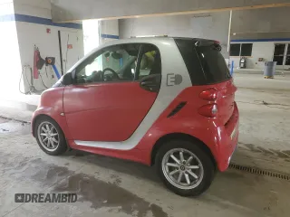 2014 Smart fortwo Passion z VIN WMEEJ9AA3EK792026, wystawiony jako Copart lot #60184015 z przebiegiem Nie podano mil oraz Czysty tytuł • Clean title. Historia ofert i sprzedaży dostępna na DreamBid. Obrazek 2.