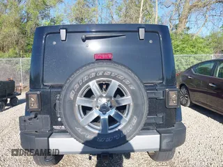 2015 Jeep Wrangler Unlimited Wrangler X with VIN 1C4BJWEG7FL677343, listed as a IAAI auction lot 42147411 with 105,920 mi miles and . Bid and sale history available at DreamBid. Image 17.