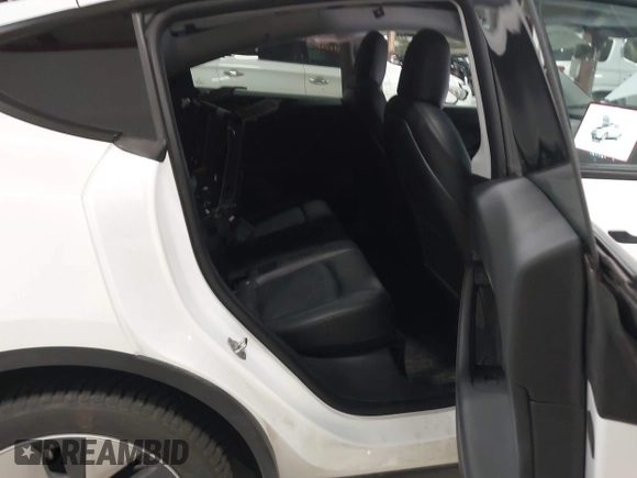 2022 Tesla Model Y Long Range z VIN 7SAYGDEE3NF358487, wystawiony jako IAAI lot #42036969 z przebiegiem 52 723 mil mil oraz . Historia ofert i sprzedaży dostępna na DreamBid. Obrazek 8.