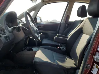2009 Suzuki SX4 Man FWD with VIN JS2YC412696201399, listed as a Copart auction lot 87543165 with 150,739 mi miles and Salvage Title. Bid and sale history available at carsss.com. Image 7.
