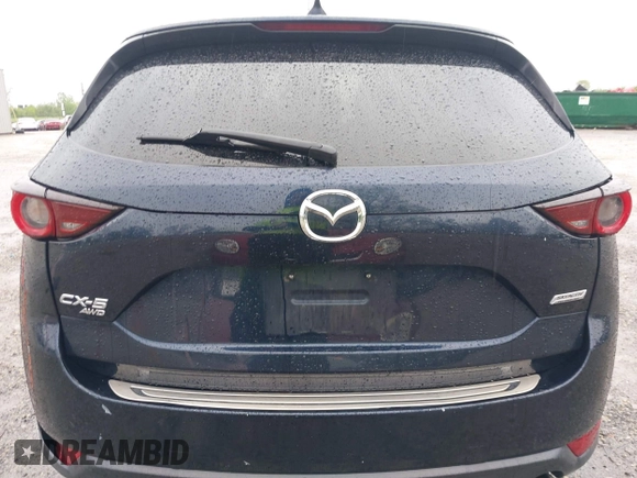 2017 Mazda CX-5 Touring z VIN JM3KFBCL4H0156571, wystawiony jako IAAI lot #42183562 z przebiegiem 135 595 mil mil oraz . Historia ofert i sprzedaży dostępna na DreamBid. Obrazek 17.