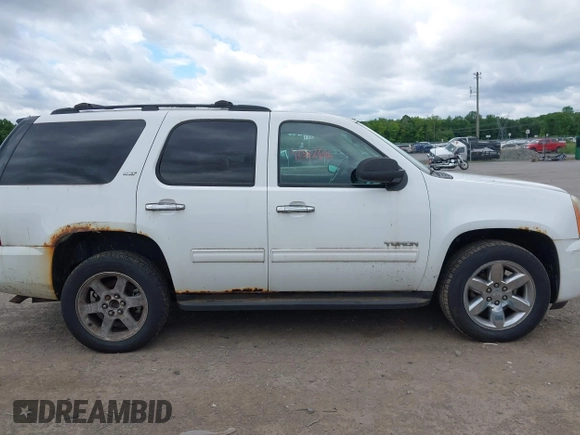 2011 GMC Yukon SLT z VIN 1GKS2CE07BR207565, wystawiony jako IAAI lot #42542596 z przebiegiem 217 759 mil mil oraz . Historia ofert i sprzedaży dostępna na DreamBid. Obrazek 14.