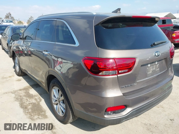 2019 Kia Sorento L with VIN 5XYPG4A35KG438309, listed as a IAAI auction lot 41539011 with 73,312 mi miles. Bid and sale history available at carsss.com. Image 3.