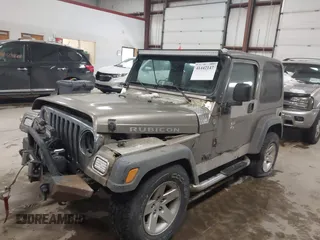 2005 Jeep Wrangler Rubicon with VIN 1J4FA69S65P311732, listed as a IAAI auction lot 41442147 with 174,277 mi miles. Bid and sale history available at carsss.com. Image 17.