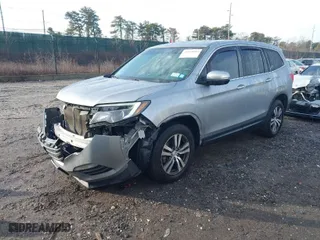2018 Honda Pilot EX-L with VIN 5FNYF6H59JB026068, listed as a IAAI auction lot 41458049 with 128,769 mi miles. Bid and sale history available at carsss.com. Image 2.