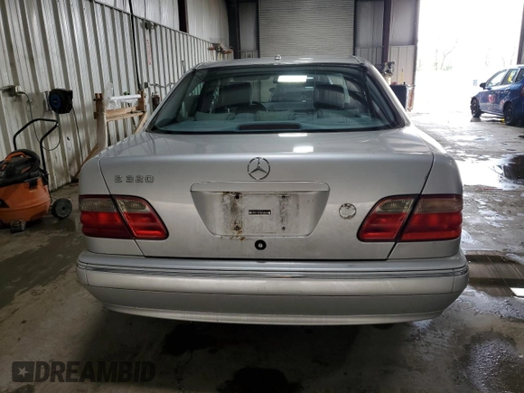 2001 Mercedes-Benz E-Class with VIN WDBJF65J61B198210, listed as a Copart auction lot 72616744 with 305,814 mi miles and Salvage Title. Bid and sale history available at carsss.com. Image 6.