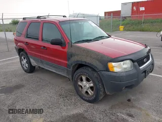 2003 Ford Escape XLT Popular 2 with VIN 1FMYU93103KA03842, listed as a IAAI auction lot 42517607 with 131,733 mi miles and . Bid and sale history available at DreamBid. Image 1.