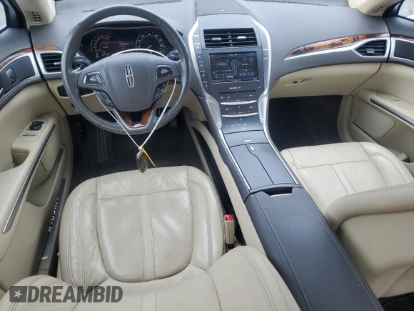 2014 Lincoln MKZ with VIN 3LN6L2J97ER817852, listed as a Copart auction lot 60980885 with 77,194 mi miles and Salvage title. Bid and sale history available at DreamBid. Image 8.