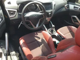 2016 Hyundai Veloster z VIN KMHTC6ADXGU256525, wystawiony jako Copart lot #55642405 z przebiegiem 163 377 mil mil oraz Szkody całkowita. Historia ofert i sprzedaży dostępna na DreamBid. Obrazek 8.