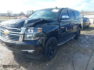 2015 Chevrolet Suburban LTZ with VIN 1GNSKKKC2FR126202, listed as a IAAI auction lot 41637048 with 234,766 mi miles. Bid and sale history available at carsss.com. Image 17.
