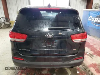 2016 Kia Sorento LX z VIN 5XYPG4A39GG073186, wystawiony jako Copart lot #57701815 z przebiegiem 146 835 mil mil oraz Szkoda całkowita • Salvage title. Historia ofert i sprzedaży dostępna na DreamBid. Obrazek 6.