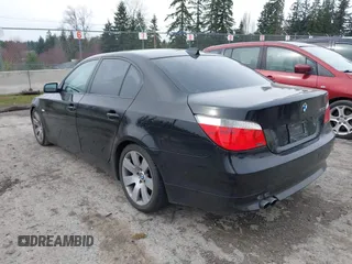 2007 BMW 5 Series 530i with VIN WBANE735X7CM46704, listed as a IAAI auction lot 41766712 with 172,163 mi miles. Bid and sale history available at carsss.com. Image 3.