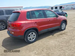 2012 Volkswagen Tiguan LE z VIN WVGAV7AX5CW097459, wystawiony jako IAAI lot #42526659 z przebiegiem 158 634 mil mil oraz . Historia ofert i sprzedaży dostępna na DreamBid. Obrazek 4.