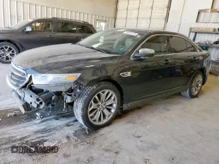 2014 Ford Taurus Limited with VIN 1FAHP2F84EG117947, listed as a Copart auction lot 59301525 with 109,012 mi miles and Salvage title. Bid and sale history available at DreamBid. Image 1.