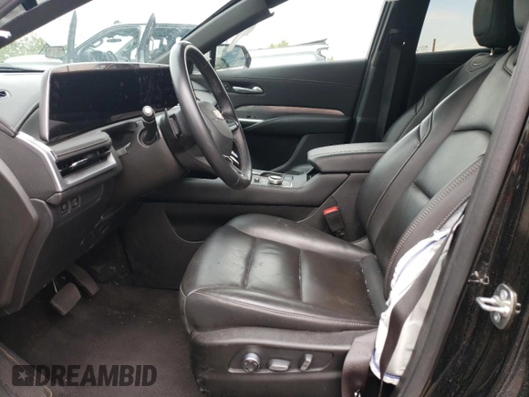 2024 Cadillac XT4 FWD Premium Luxury z VIN 1GYFZCR43RF221412, wystawiony jako Copart lot #55507885 z przebiegiem 23 702 mil mil oraz Tytuł czysty. Historia ofert i sprzedaży dostępna na DreamBid. Obrazek 7.