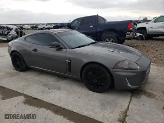 2011 Jaguar XK with VIN SAJWA4DC7BMB40355, listed as a Copart auction lot 88007985 with 0 mi miles and Salvage Title. Bid and sale history available at carsss.com. Image 4.