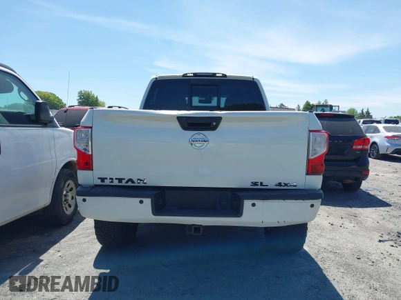 2017 Nissan Titan SL z VIN 1N6AA1E51HN503222, wystawiony jako IAAI lot #41908062 z przebiegiem 121 334 mil mil oraz . Historia ofert i sprzedaży dostępna na DreamBid. Obrazek 16.