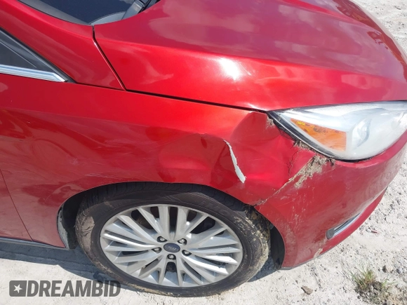 2018 Ford Focus Titanium z VIN 1FADP3J23JL295888, wystawiony jako IAAI lot #42524088 z przebiegiem 108 812 mil mil oraz . Historia ofert i sprzedaży dostępna na DreamBid. Obrazek 17.