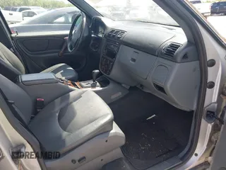1998 Mercedes-Benz M-Class with VIN 4JGAB54E3WA031579, listed as a IAAI auction lot 42004335 with 156,898 mi miles. Bid and sale history available at carsss.com. Image 5.