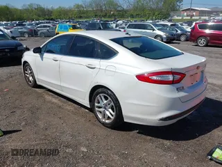 2016 Ford Fusion SE with VIN 3FA6P0H79GR165486, listed as a IAAI auction lot 42052490 with 141,927 mi miles. Bid and sale history available at carsss.com. Image 3.