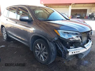 2020 Honda Pilot EX-L with VIN 5FNYF5H50LB011021, listed as a IAAI auction lot 41382249 with 113,884 mi miles. Bid and sale history available at carsss.com. Image 1.