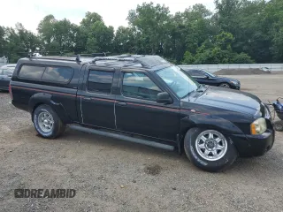 2004 Nissan Frontier SC with VIN 1N6MD29Y94C453609, listed as a Copart auction lot 66039585 with 76,480 mi miles and Clean title. Bid and sale history available at DreamBid. Image 4.