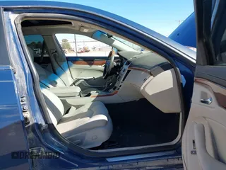 2009 Cadillac CTS RWD with VIN 1G6DV57V990146995, listed as a IAAI auction lot 41209631 with 172,229 mi miles and . Bid and sale history available at carsss.com. Image 5.