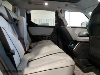 2022 Rivian R1T Adventure Package with VIN 7FCTGAAA4NN014462, listed as a Copart auction lot 73310644 with 89 mi miles and Salvage Title. Bid and sale history available at carsss.com. Image 10.