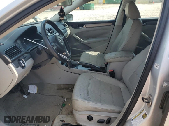 2014 Volkswagen Passat SE with VIN 1VWBT7A36EC047828, listed as a Copart auction lot 63711855 with 204,196 mi miles and Clean title. Bid and sale history available at DreamBid. Image 7.