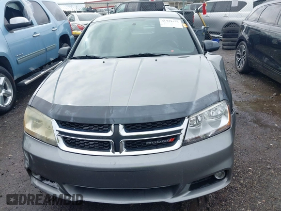 2013 Dodge Avenger SXT with VIN 1C3CDZCB5DN621881, listed as a IAAI auction lot 41739476 with 245,816 mi miles and . Bid and sale history available at DreamBid. Image 12.