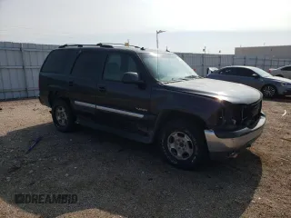 2003 GMC Yukon SLT with VIN 1GKEK13Z93J159795, listed as a Copart auction lot 64915913 with 414,569 mi miles and Salvage Title. Bid and sale history available at carsss.com. Image 4.