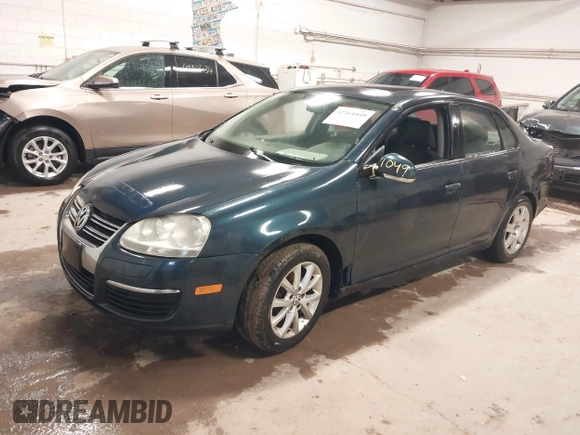 2009 Volkswagen Jetta z VIN 3VWHZ71K79M020139, wystawiony jako IAAI lot #42292767 z przebiegiem 156 619 mil mil oraz . Historia ofert i sprzedaży dostępna na DreamBid. Obrazek 2.