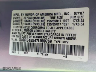 2007 Honda CR-V EX with VIN 5J6RE48547L009769, listed as a IAAI auction lot 41939288 with 256,805 mi miles. Bid and sale history available at carsss.com. Image 9.