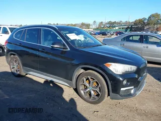2018 BMW X1 xDrive28i with VIN WBXHT3C36J5L29746, listed as a IAAI auction lot 41547100 with 103,420 mi miles and . Bid and sale history available at DreamBid. Image 1.