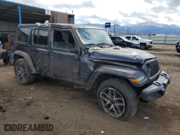 2024 Jeep Wrangler Sport S with VIN 1C4RJXN64RW202828, listed as a Copart auction lot 54202415 with 30,459 mi miles and Salvage title. Bid and sale history available at DreamBid. Image 4.