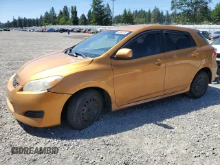2009 Toyota Matrix S with VIN 2T1LE40E69C005921, listed as a Copart auction lot 58860675 with Not provided miles and Salvage title. Bid and sale history available at DreamBid. Image 1.