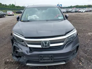 2019 Honda Pilot EX-L with VIN 5FNYF6H5XKB096065, listed as a IAAI auction lot 42631239 with 171,768 mi miles and . Bid and sale history available at DreamBid. Image 12.