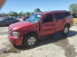 2012 Chevrolet Tahoe LS with VIN 1GNSCAE02CR319700, listed as a Copart auction lot 50321735 with 180,403 mi miles and Salvage title. Bid and sale history available at DreamBid. Image 1.
