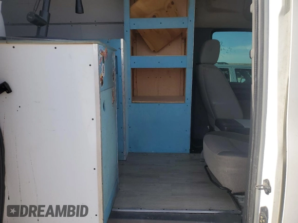 2017 Nissan NV Cargo SV z VIN 1N6BF0LY0HN805095, wystawiony jako Copart lot #53978975 z przebiegiem 131 896 mil mil oraz Szkoda całkowita • Salvage title. Historia ofert i sprzedaży dostępna na DreamBid. Obrazek 10.