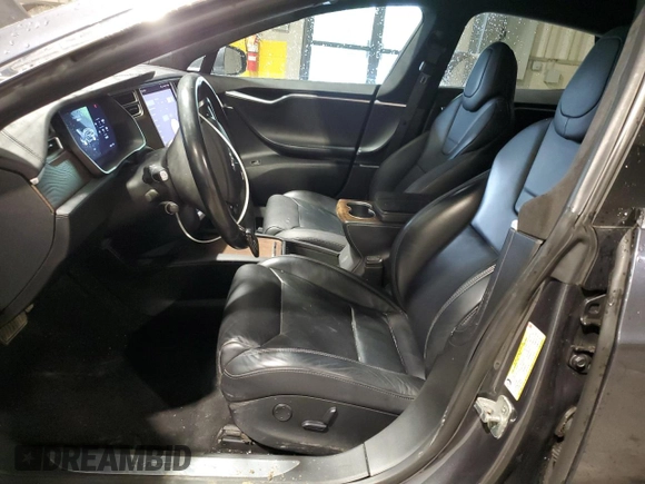 2017 Tesla Model S 100D with VIN 5YJSA1E29HF210731, listed as a Copart auction lot 56762565 with 114,117 mi miles and Salvage title. Bid and sale history available at DreamBid. Image 7.