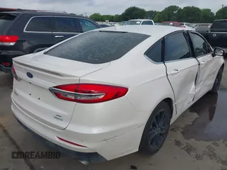 2020 Ford Fusion SE with VIN 3FA6P0HD7LR148007, listed as a IAAI auction lot 42132944 with 63,328 mi miles and . Bid and sale history available at DreamBid. Image 4.