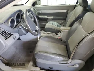 2008 Chrysler Sebring Touring z VIN 1C3LC55R08N271099, wystawiony jako Copart lot #53620705 z przebiegiem 134 637 mil mil oraz Szkoda całkowita • Salvage title. Historia ofert i sprzedaży dostępna na DreamBid. Obrazek 7.