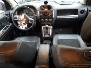 2016 Jeep Compass Latitude with VIN 1C4NJCEB7GD664653, listed as a Copart auction lot 87313664 with 64,580 mi miles and Salvage Title. Bid and sale history available at carsss.com. Image 8.
