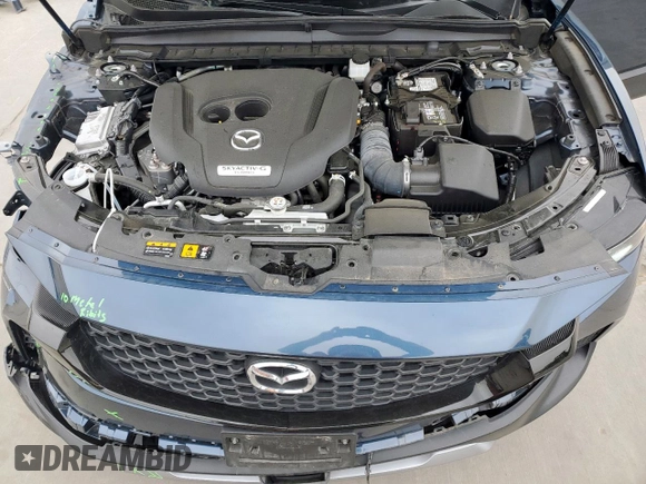 2023 Mazda CX-50 2.5 Turbo with VIN 7MMVABXY4PN148160, listed as a Copart auction lot 51306595 with 36,622 mi miles and Salvage title. Bid and sale history available at DreamBid. Image 12.
