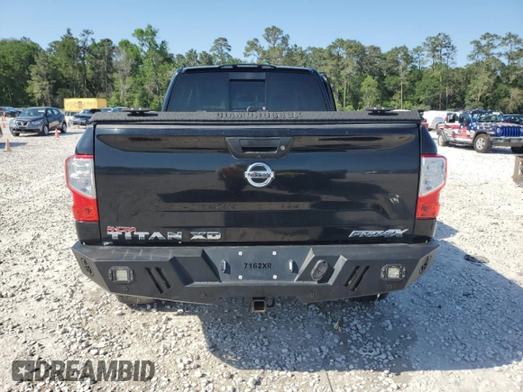2016 Nissan Titan SL z VIN 1N6BA1F4XGN509402, wystawiony jako Copart lot #52410795 z przebiegiem 37 421 mil mil oraz Szkoda całkowita • Salvage title. Historia ofert i sprzedaży dostępna na DreamBid. Obrazek 6.