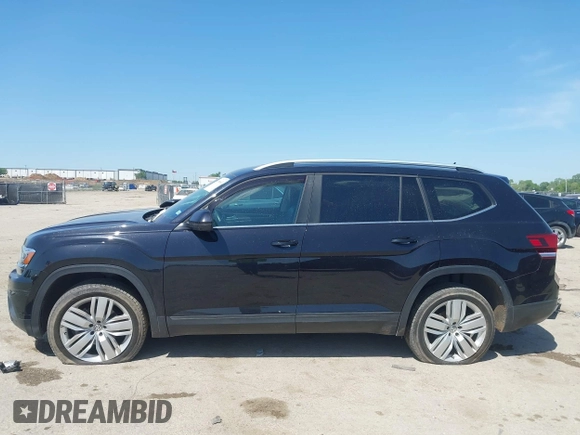 2019 Volkswagen Atlas SE with VIN 1V2WR2CA4KC595211, listed as a IAAI auction lot 41986643 with 96,299 mi miles and . Bid and sale history available at DreamBid. Image 14.