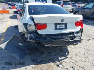 2014 BMW 3 Series 328i with VIN WBA3A5C58EP602669, listed as a IAAI auction lot 42514389 with 187,330 mi miles and . Bid and sale history available at DreamBid. Image 6.