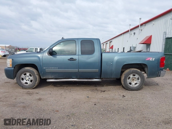 2007 Chevrolet Silverado 1500 1LT with VIN 1GCEK19087Z649494, listed as a IAAI auction lot 41913771 with 196,954 mi miles and . Bid and sale history available at DreamBid. Image 14.